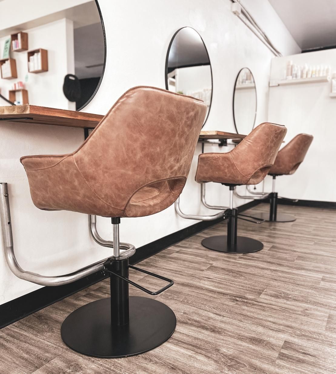 A Woman With Long Purple Hair Is Wearing A Fifth Shirt — Freedom Hairdressing In Casino, NSW