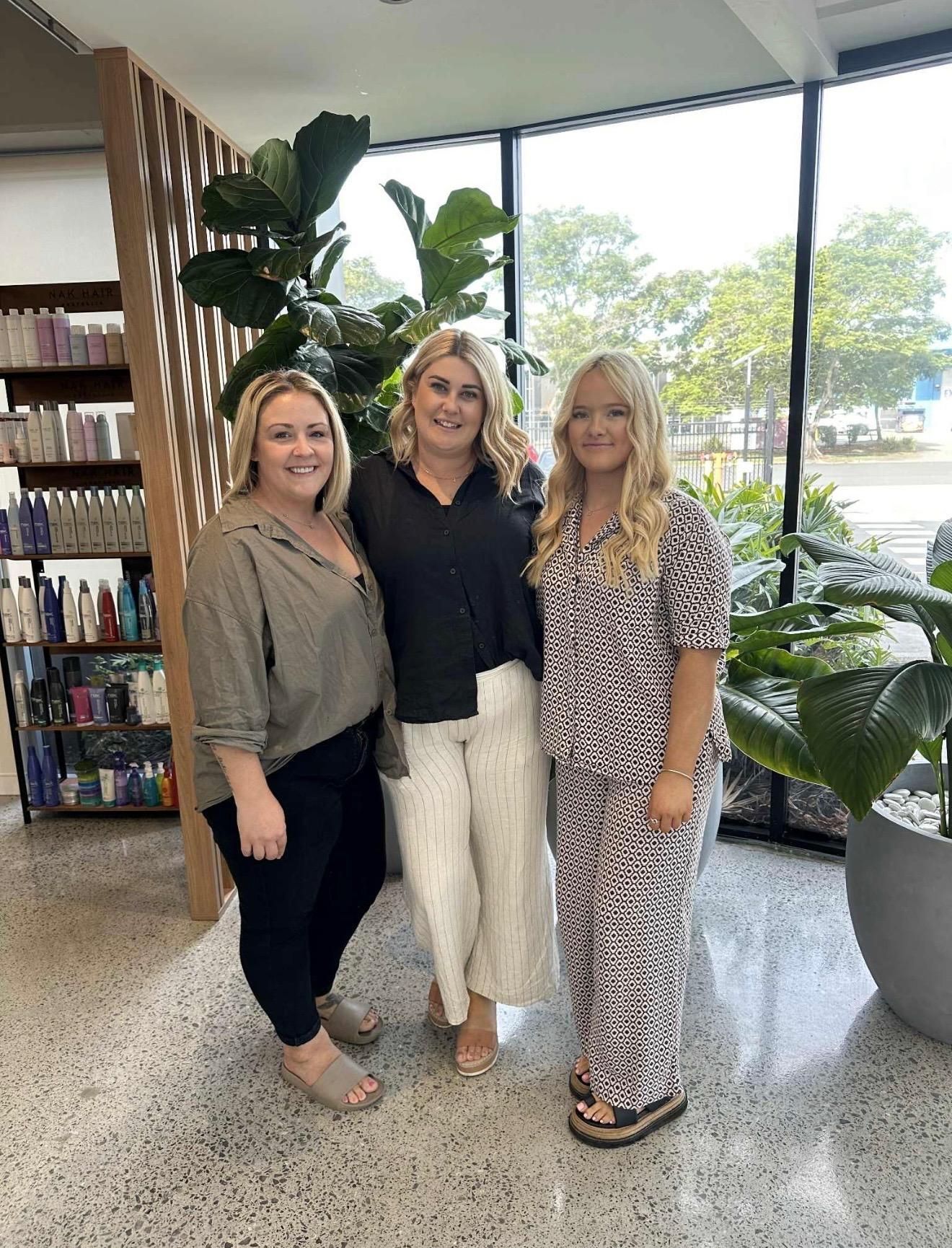 A Group Of Women Are Posing For A Picture Together — Freedom Hairdressing In Casino, NSW
