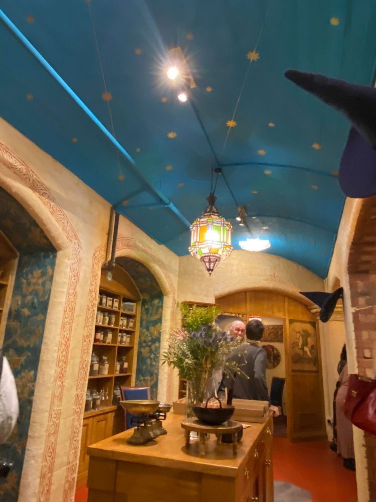 A Room with A Blue Ceiling and A Table with Flowers on It — Medium in Bakery Hill, VIC