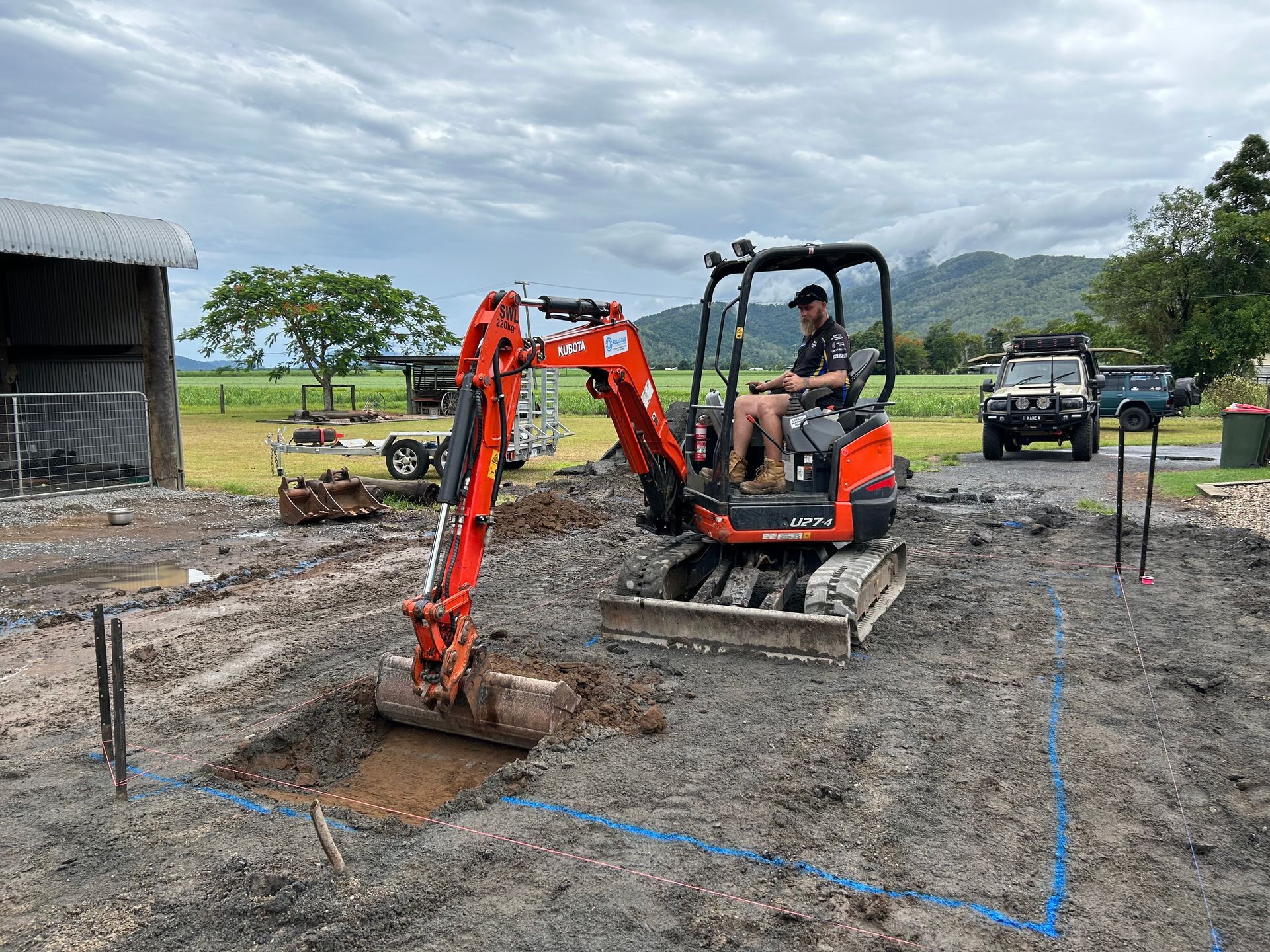 Vermeer machine digging the ground — Mini Excavator Hire in Cairns, QLD
