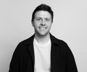 Black and white studio photo of board member James.