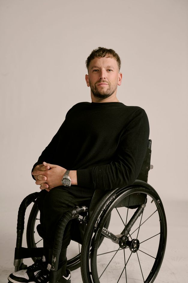 Solo portrait photo of Dylan Alcott against a white background.