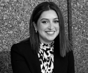 Black and white studio photo of DAF team member Maddison.