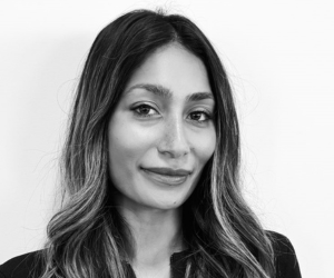 Black and white studio photo shoot of board member Priyanka