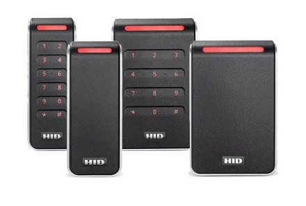 A group of hid cards are sitting next to each other on a white surface.