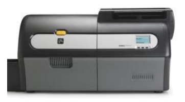 A black and white printer is sitting on a table.