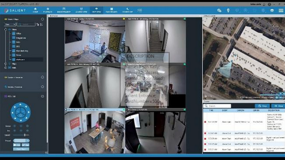 A computer screen shows a room with a table and chairs