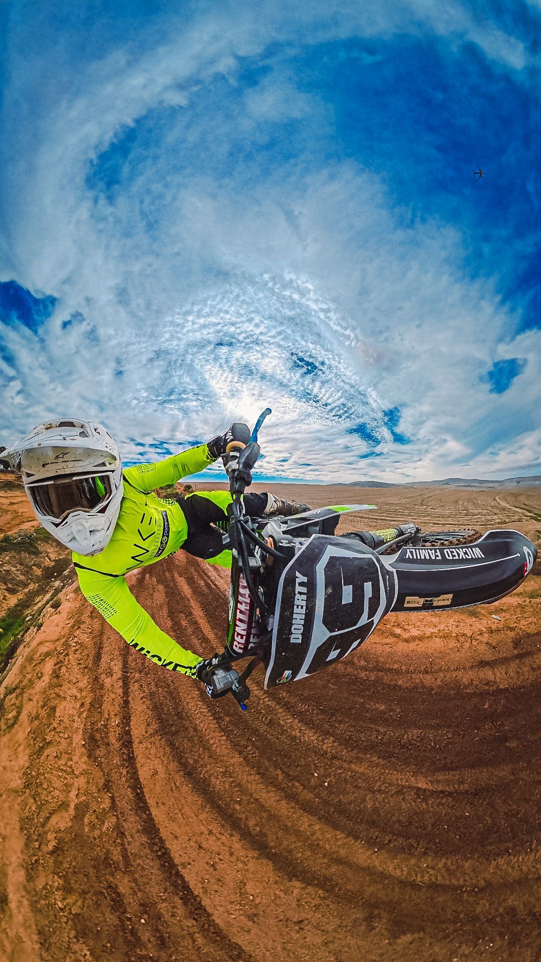 A person is riding a dirt bike.