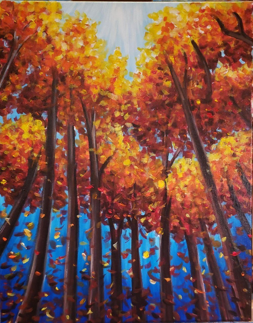 A painting of trees with autumn leaves on them