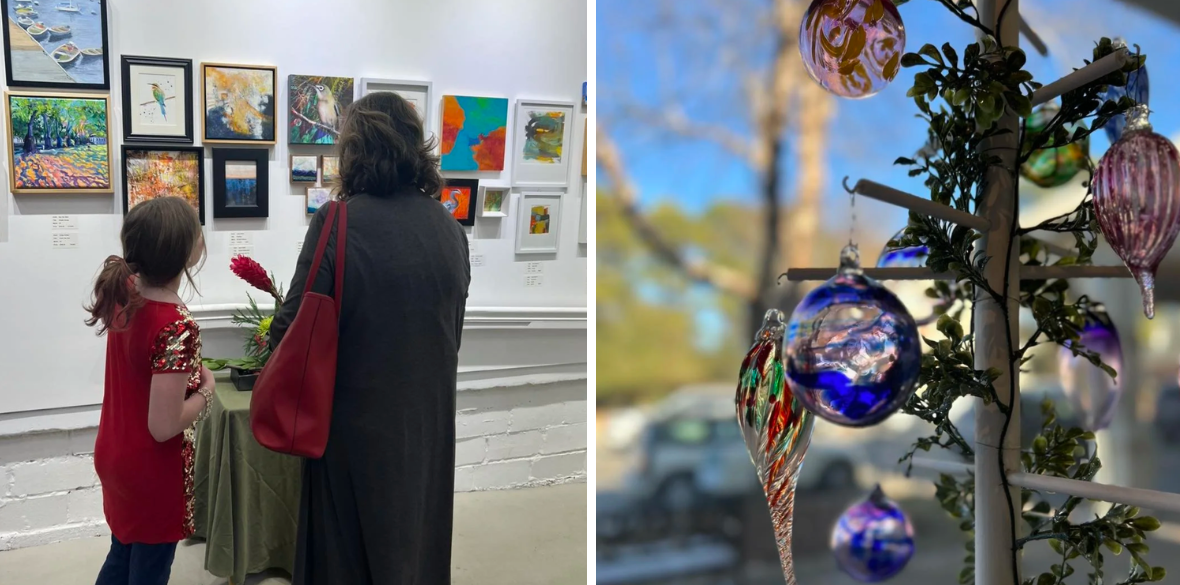 Two people at an art gallery look at paintings. Ornaments hang on a decorative tree in the right panel.