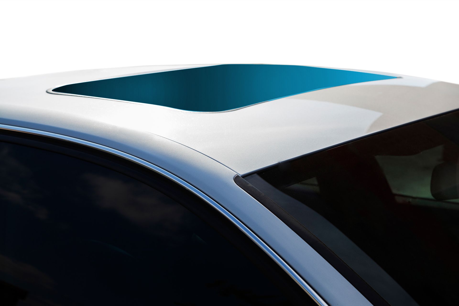 White car roof with open sunroof.