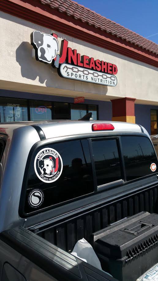 Dietary Supplements Store — Car In Front Of Unleashed Sports Nutrition Store in Rio Rancho NM
