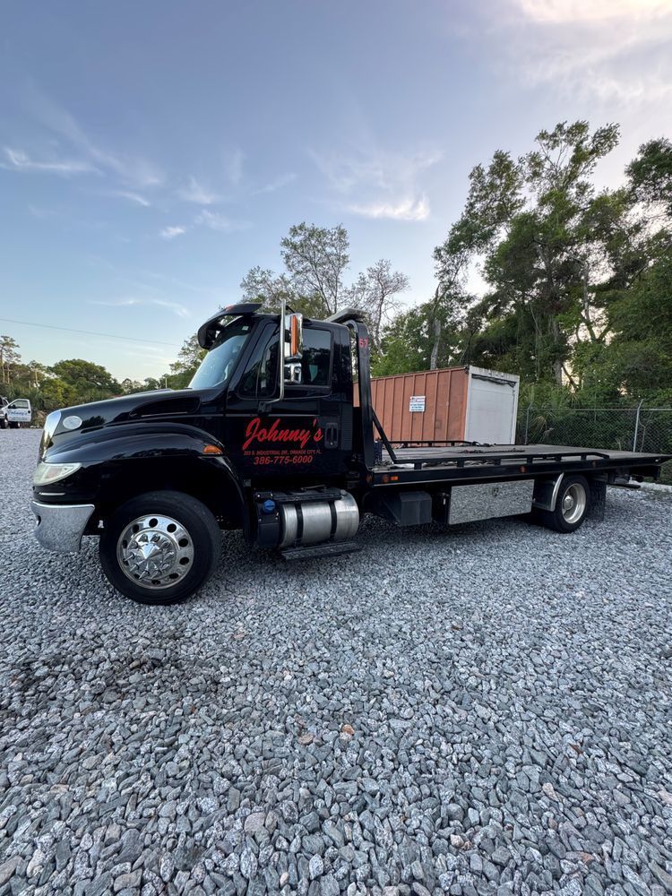 Black tow truck with red 