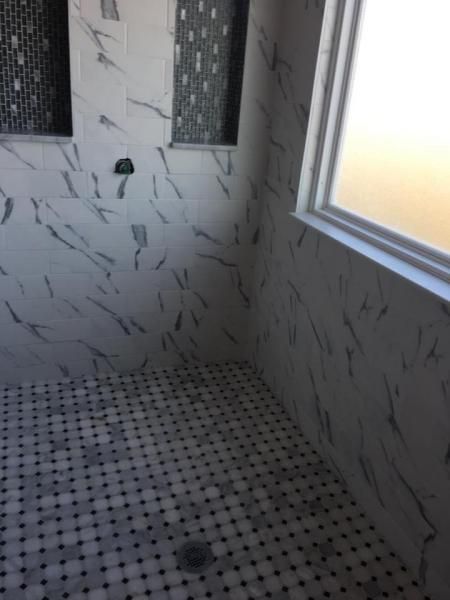 white and grey tile in bathroom