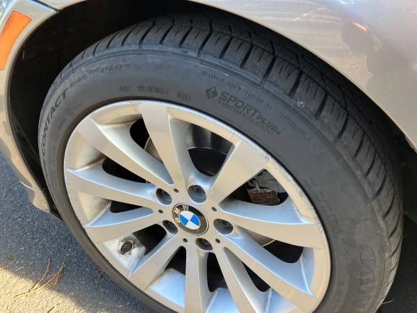 A close up of a bmw wheel and tire