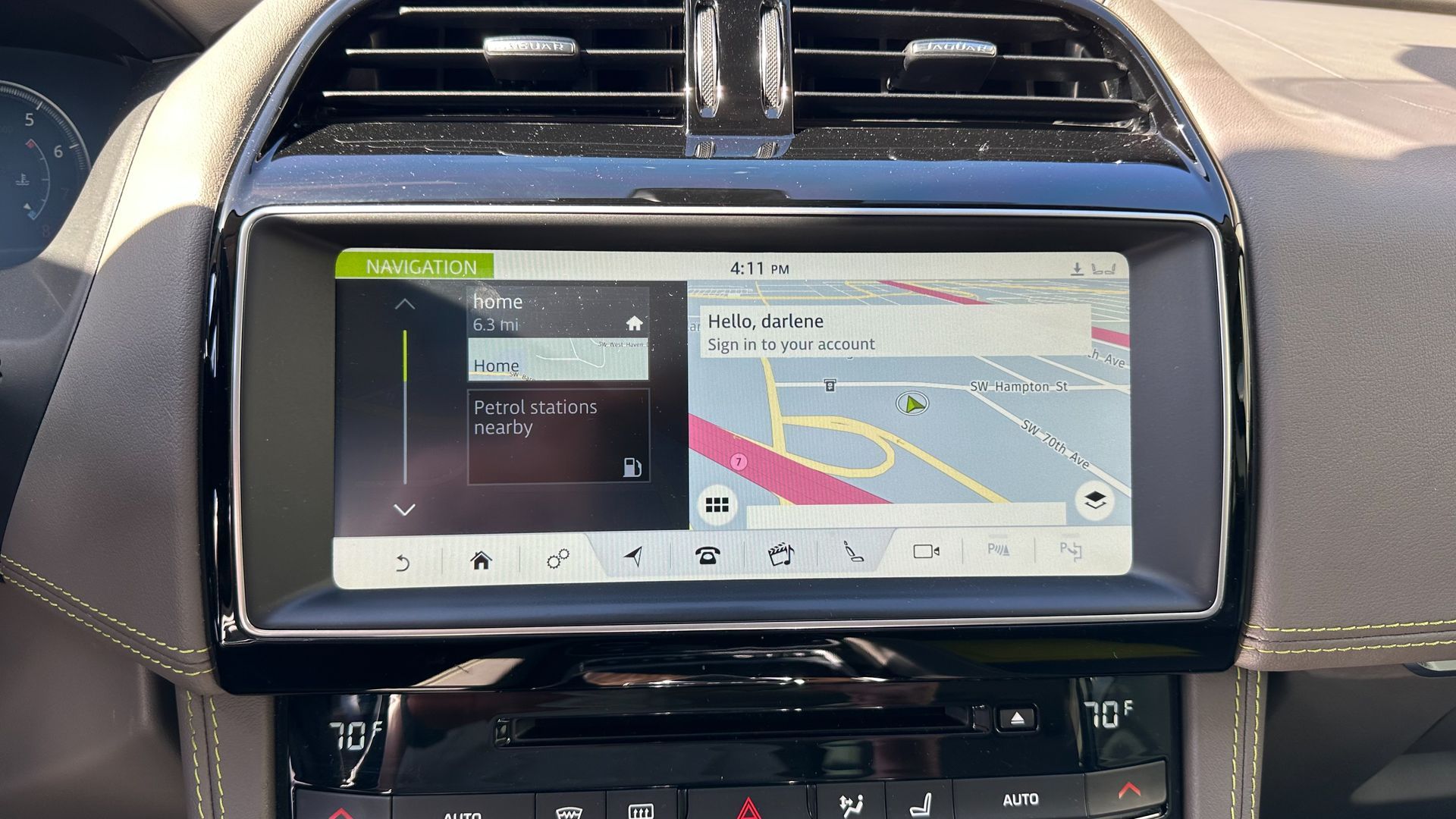 A car dashboard with a navigation system on it