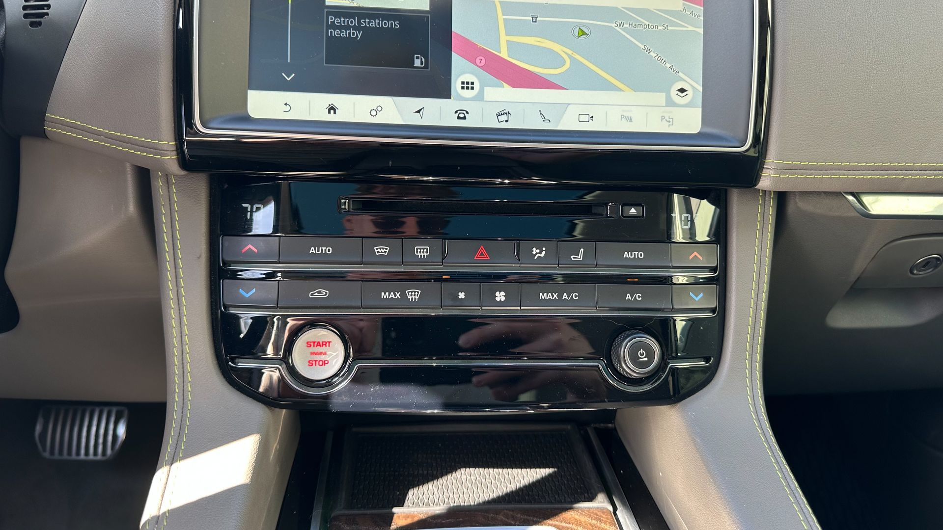 The dashboard of a car with a navigation system and a gps.