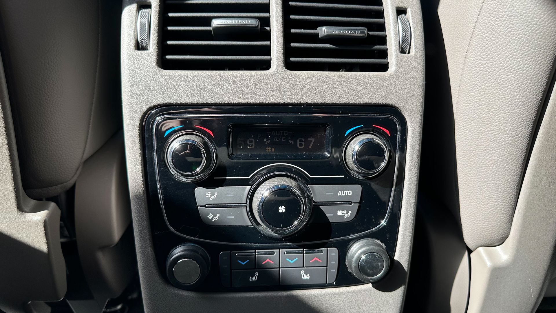 A close up of a car 's rear air conditioning system