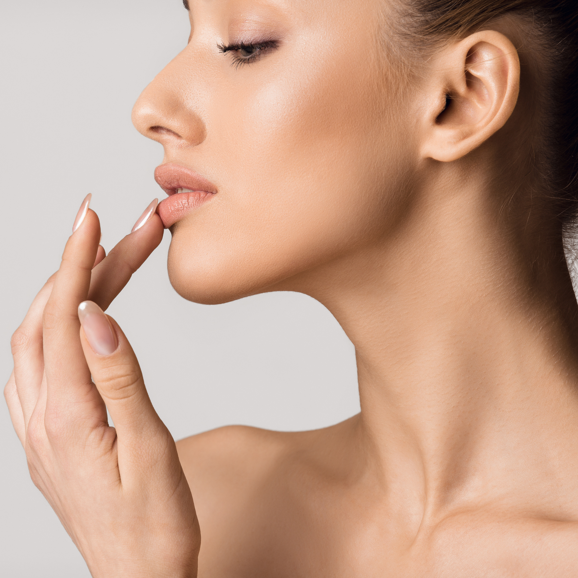 woman with full lips from dermal fillers