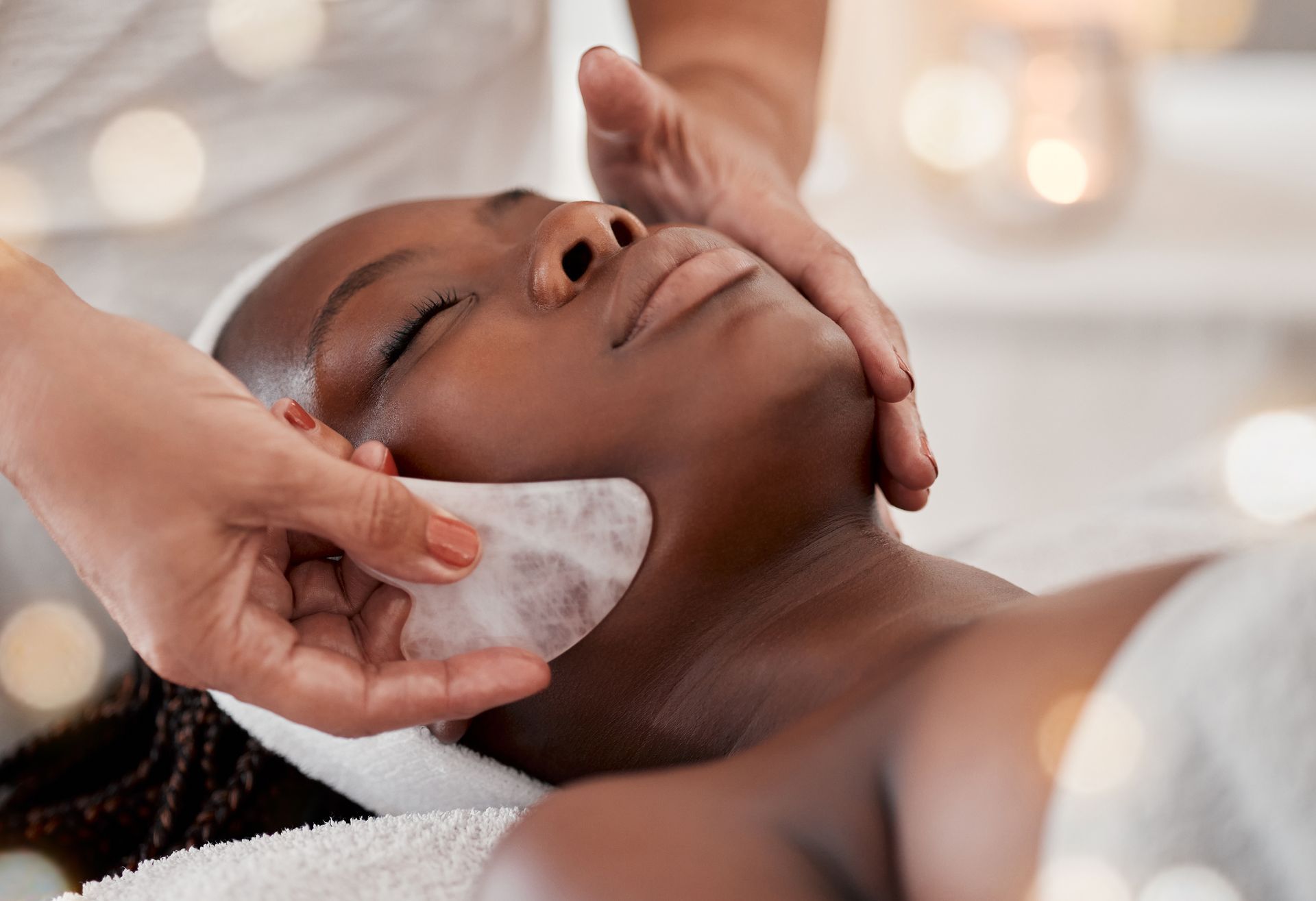 black woman gua sha facial