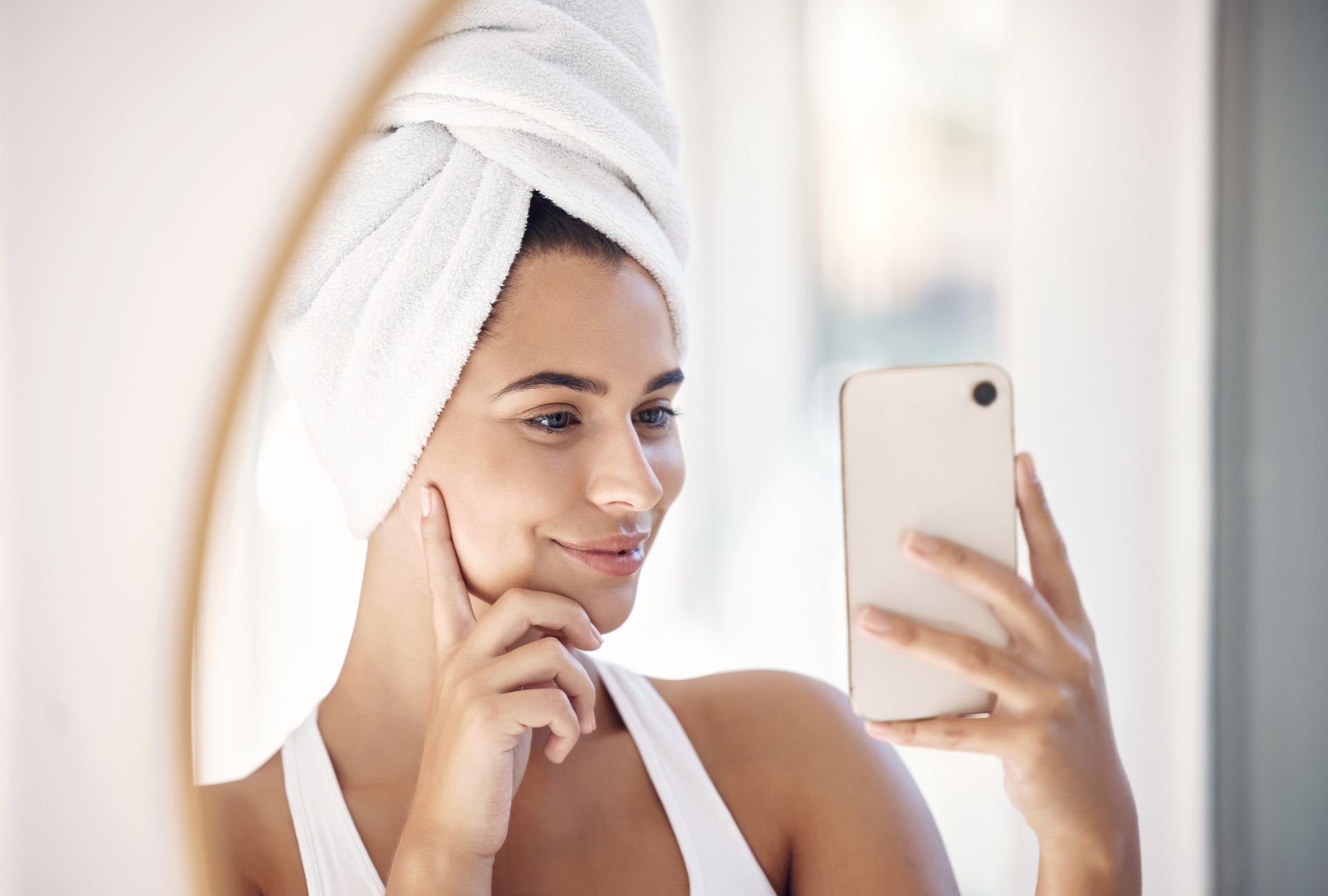 mirror selfie skincare woman