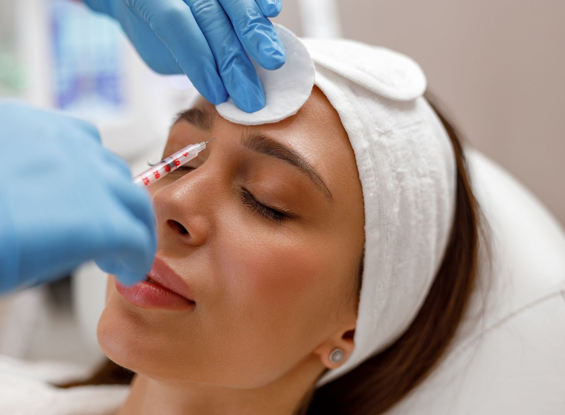 woman getting cosmetic injections