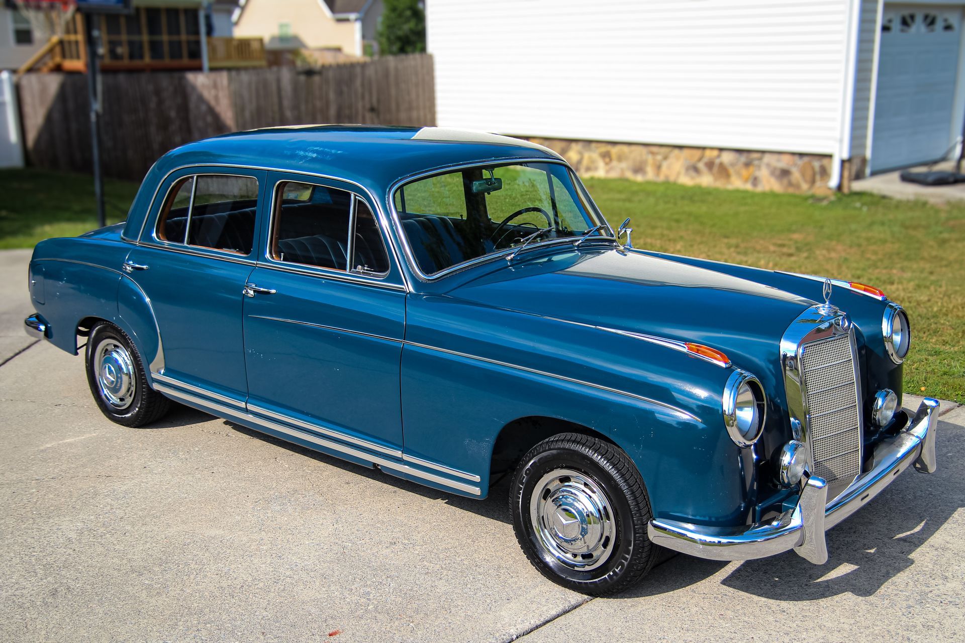 Blue 1958 Mercedes S220 with single stage paint.