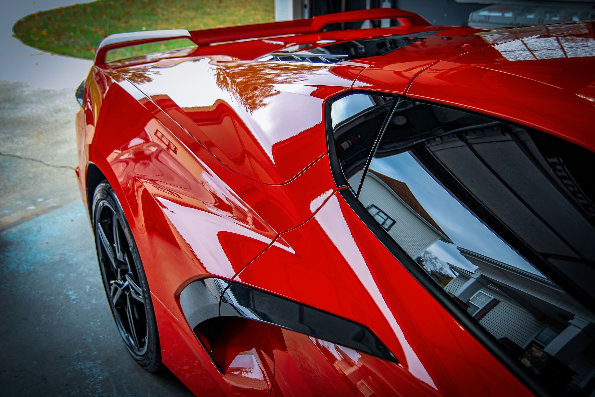 A glossy red c8 corvette after paint correction and ceramic coating by Ringgold Auto Detail