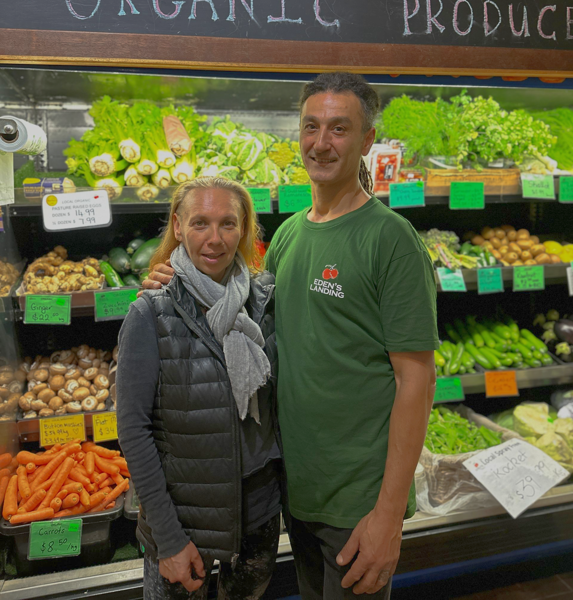 Amir and Ricky Zikhron, owners of Eden’s Landing organic grocery store in Mullumbimby, standing in front of fresh local produce