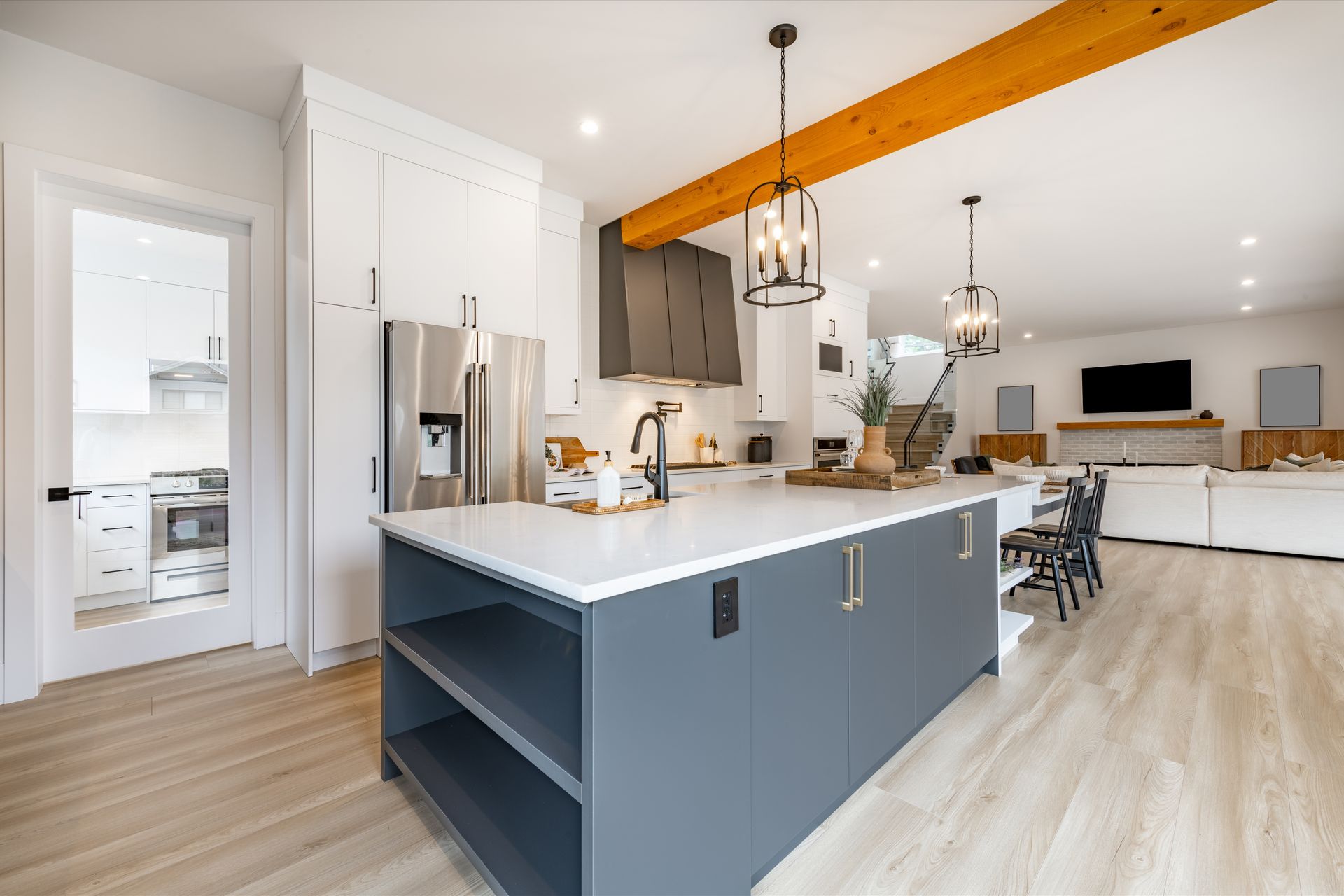 There is a large island in the middle of the kitchen.