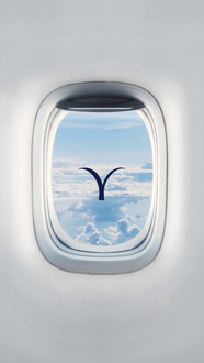 View from an airplane window of blue sky and clouds with a stylized 