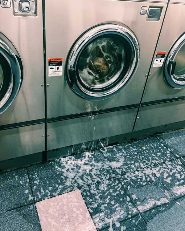 water damage caused by leaking washing machine