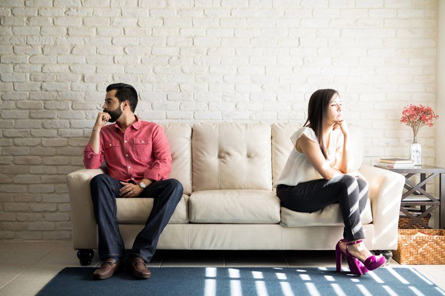Couple Facing Away To Each Other — Houston, TX — IRS Tax Fighters