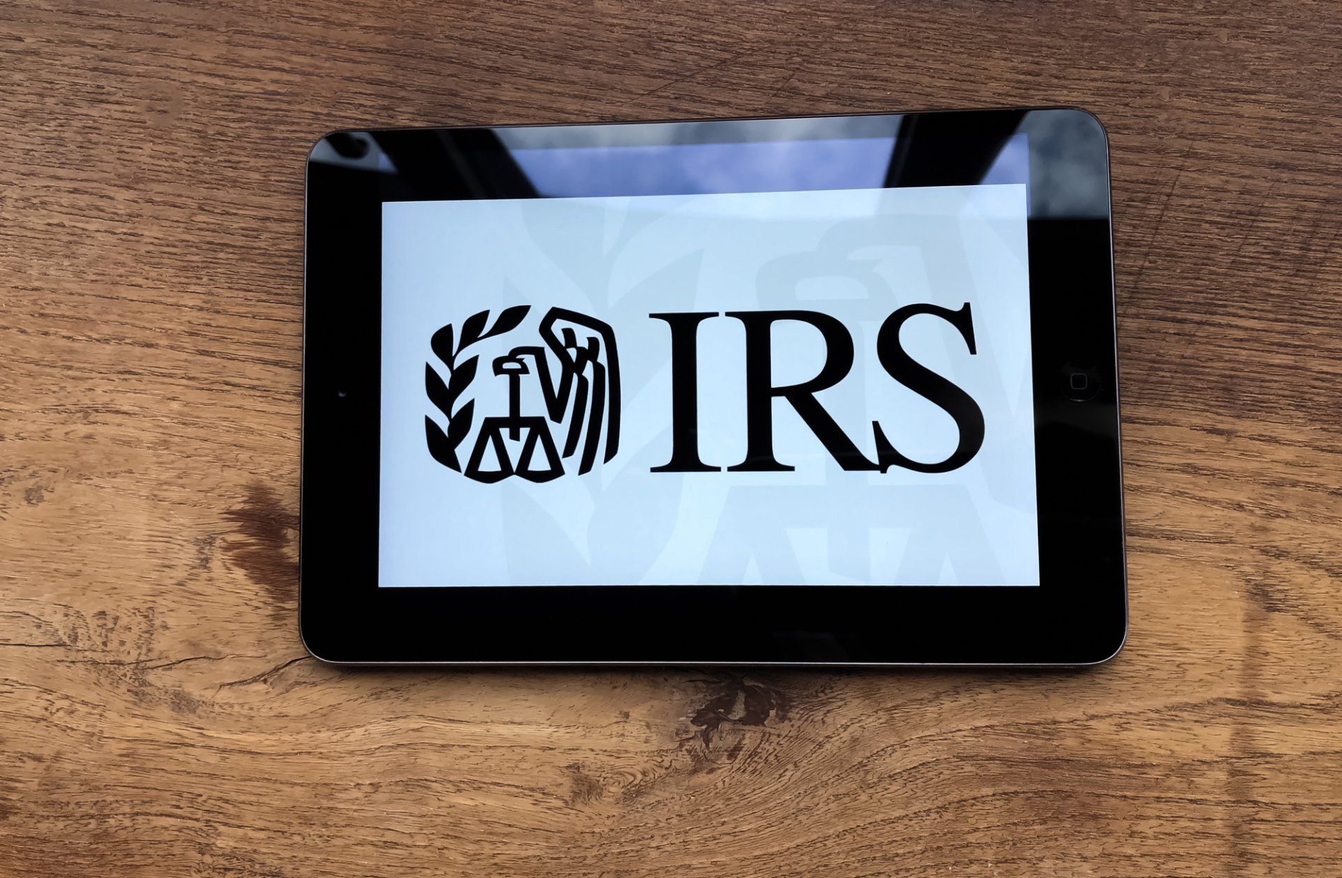 Ipad with IRS logo and 