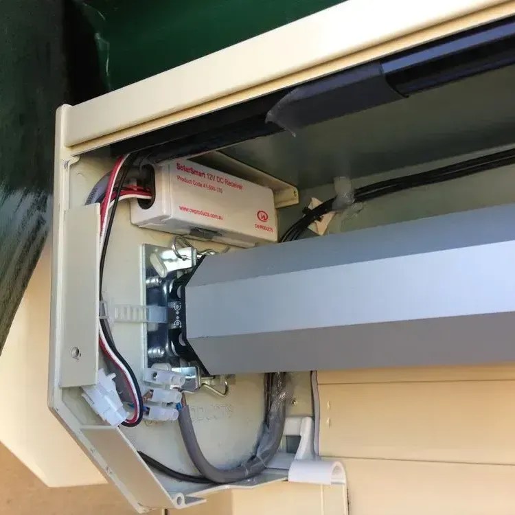 A Brick House With A Porch And Shutters On The Windows — LT Shutters in Bellambi, NSW