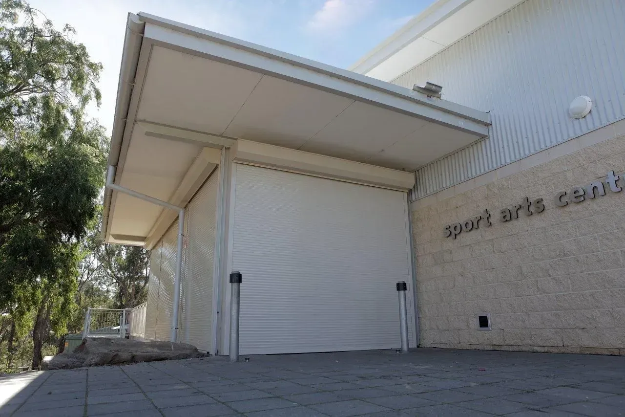 A Bar With A Sign That Says Xxx Gold On It — LT Shutters in Bellambi, NSW