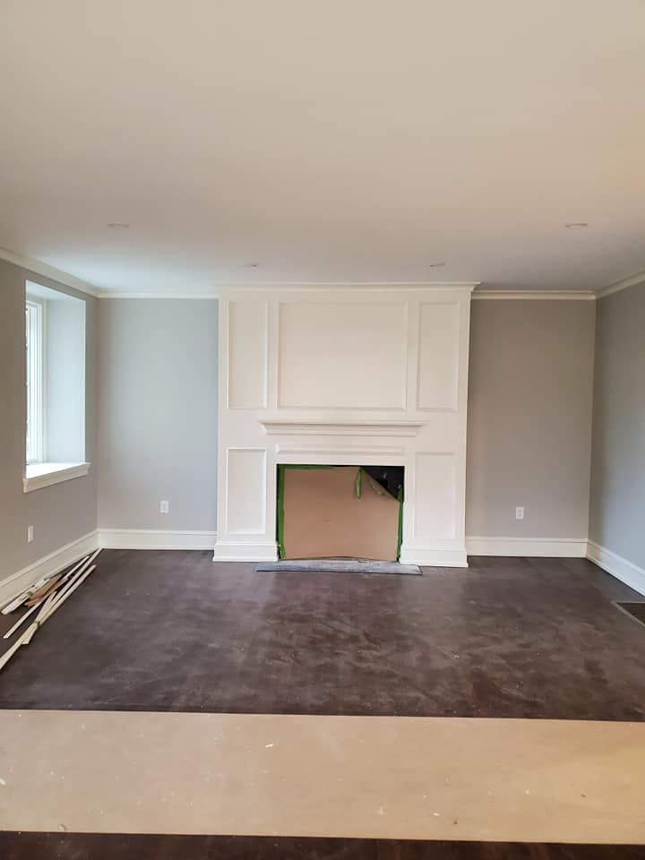 There is a fireplace in the middle of the room.