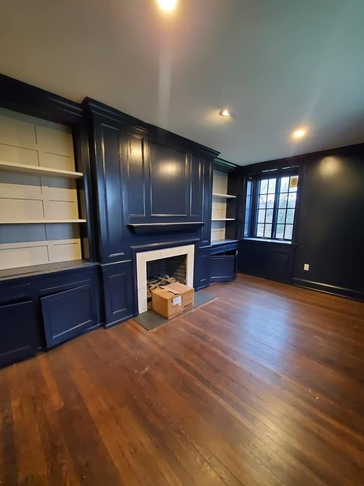 There is a fireplace in the middle of the room.