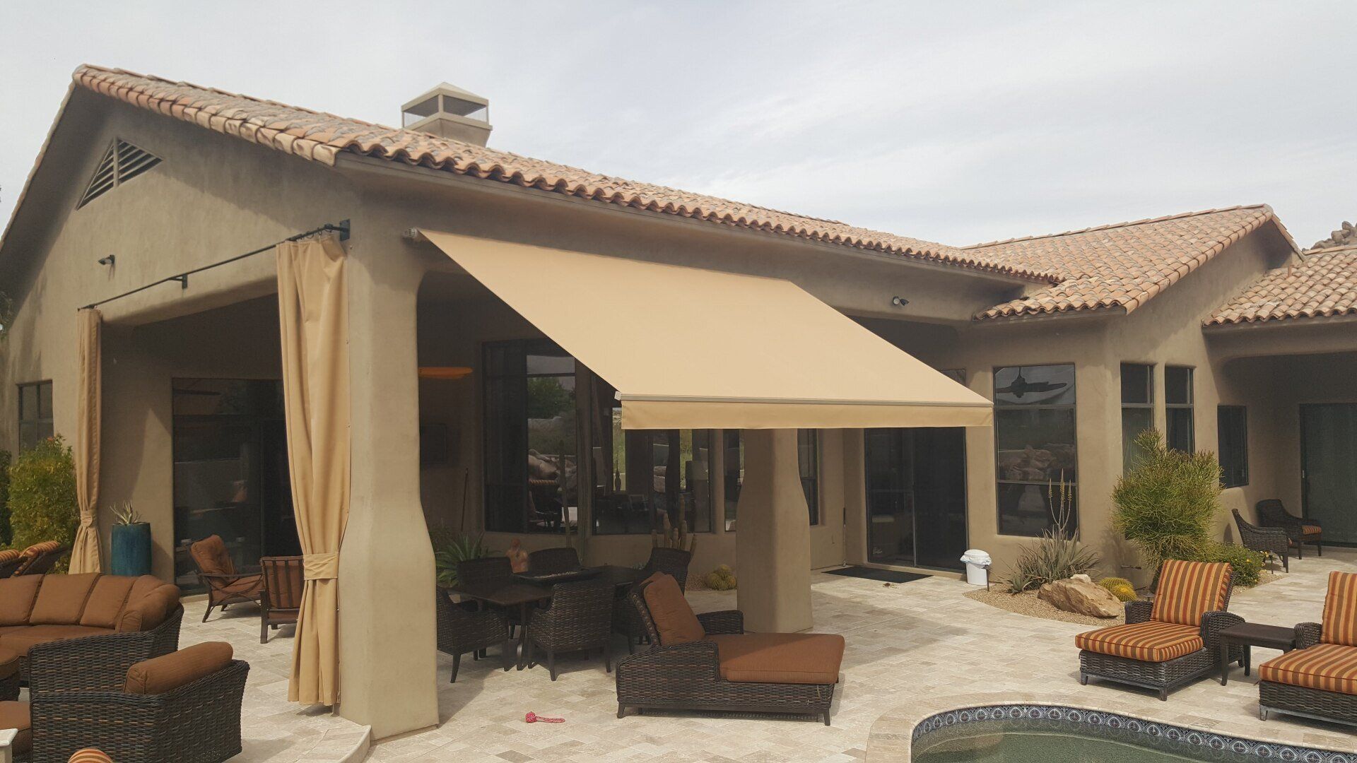 retractable style patio awning in Phoenix, AZ backyard