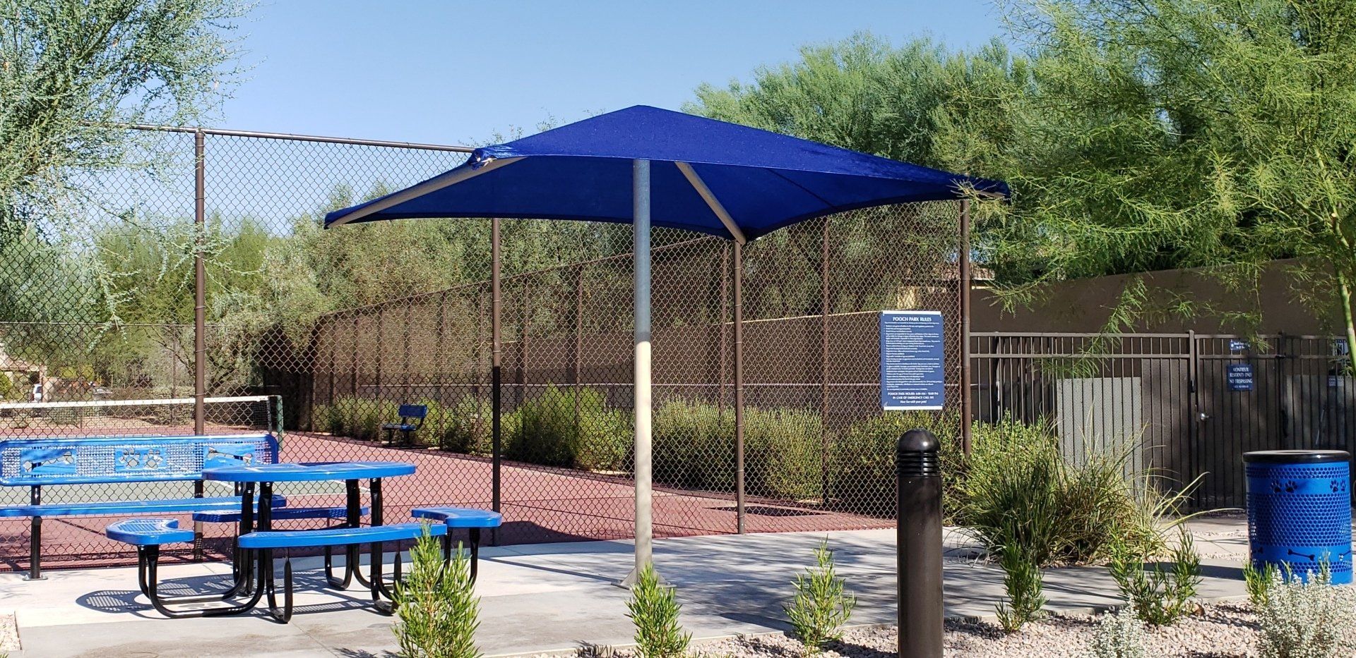 blue umbrella shade over picnic table in Phoenix, AZ