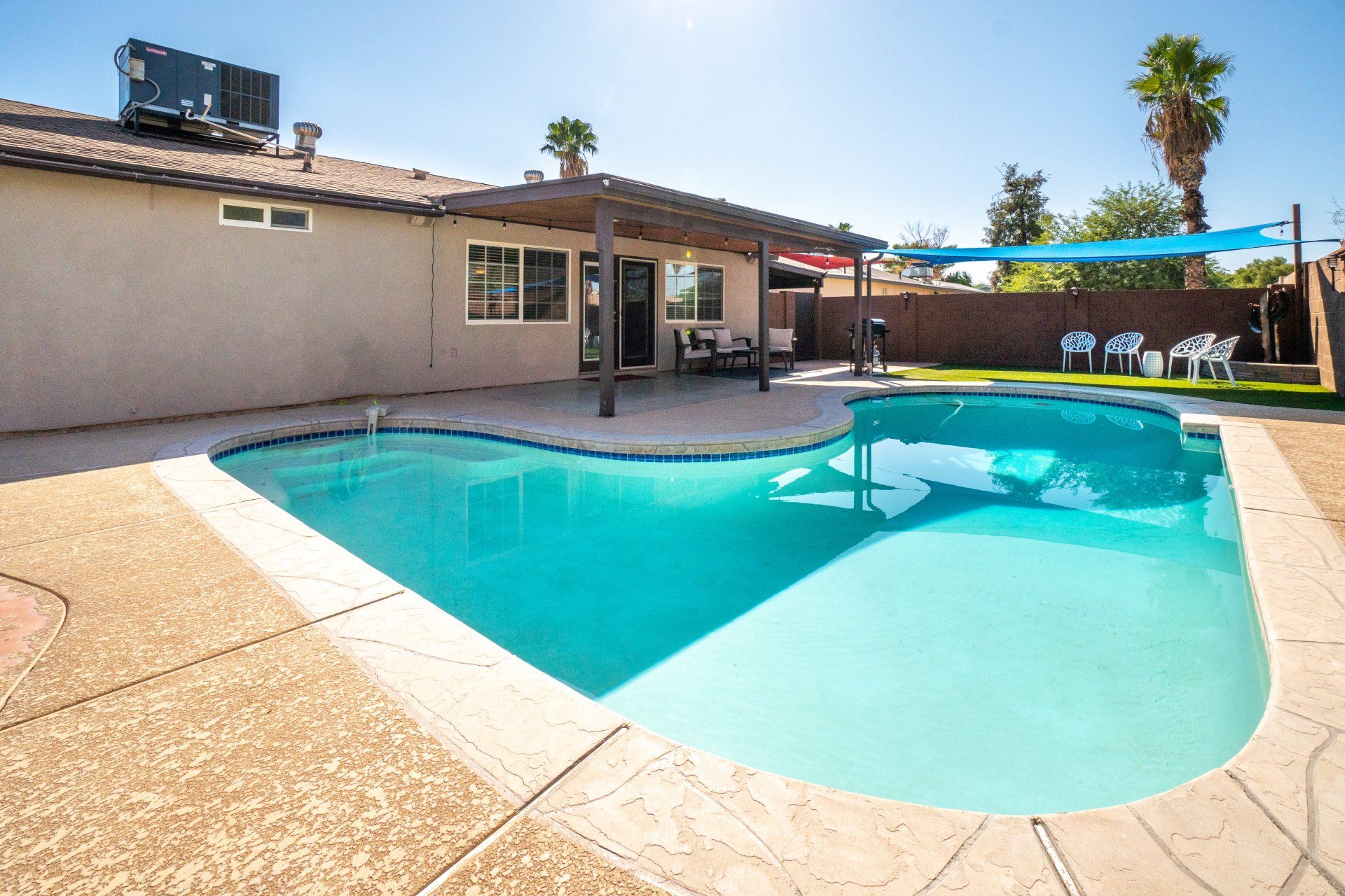 arizona swimming pool covered by awning