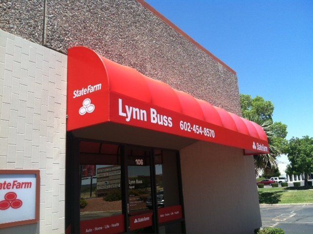 State Farm in Phoenix, AZ with a red awning built by AZ Awnings
