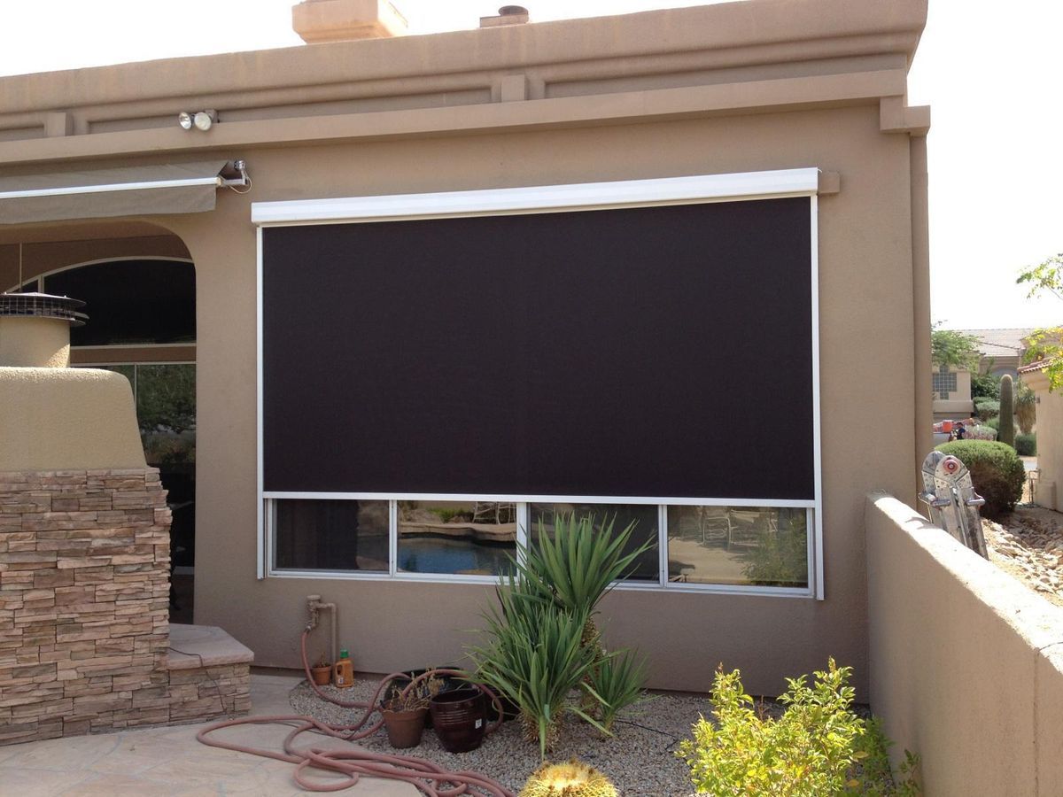 example of a black with white frame retractable awning