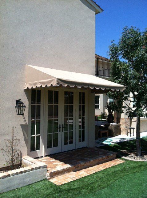 Example of white awning from AZ Awning on commercial building
