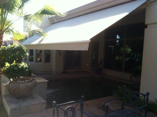 retractable awning in Phoenix, AZ backyard