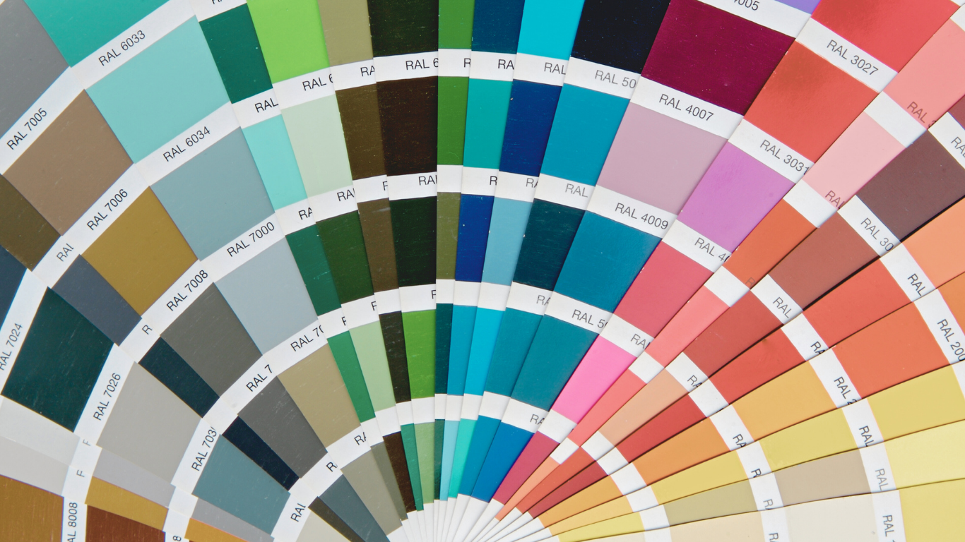 Color swatch fan displaying an array of hues, including blues, greens, pinks, and oranges.