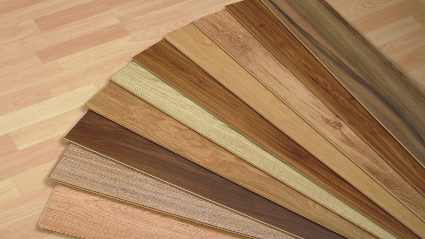 Samples of various wood flooring colors and grains.