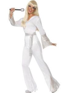 Woman in a White Jumpsuit With Bell Sleeves, Holding a Microphone — Costumes Galore in Maroochydore, QLD