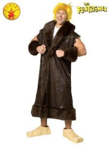 Man in Barney Rubble Costume: Brown Fur Coat, Yellow Wig, Smiling, White Background — Costumes Galore in Maroochydore, QLD