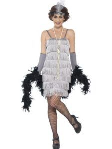 Woman in a Silver Flapper Dress With Matching Headband, Gloves, and Black Boa — Costumes Galore in Maroochydore, QLD
